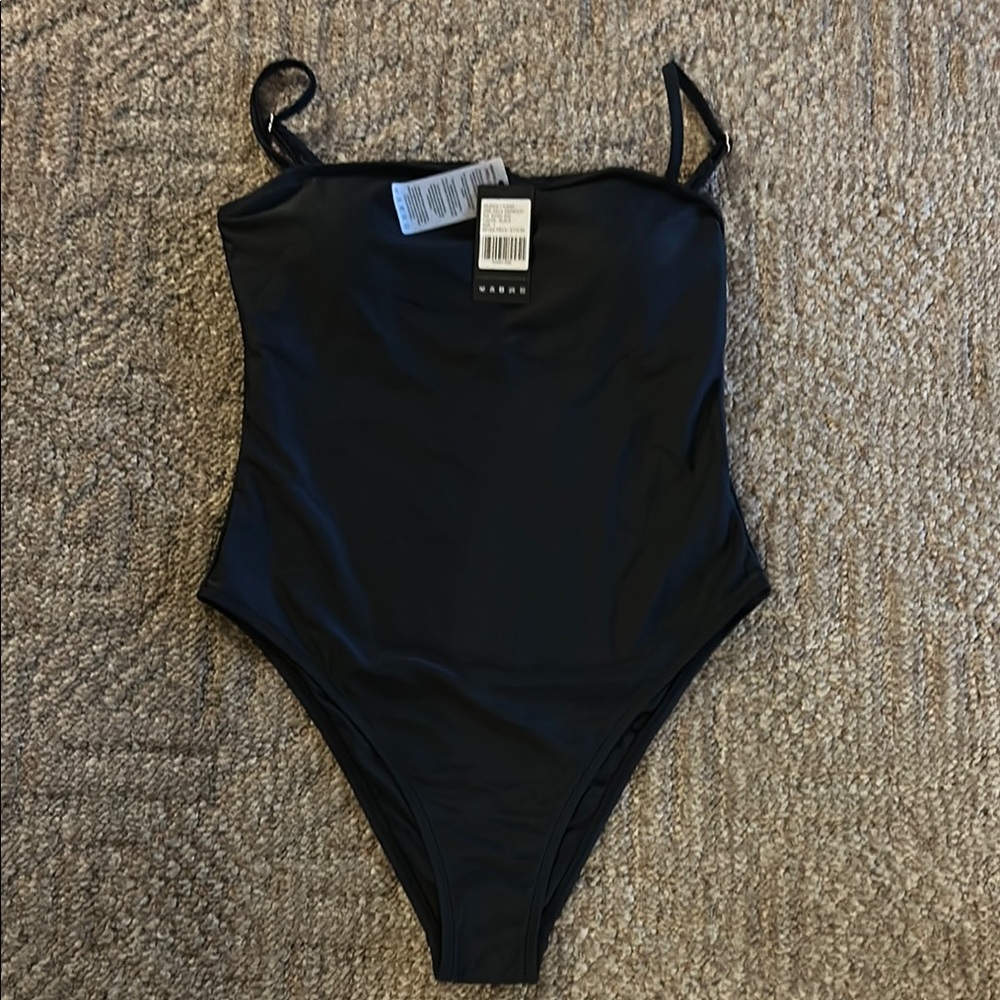 Relleciga Sleek Black Ribbed One-Piece Swimsuit